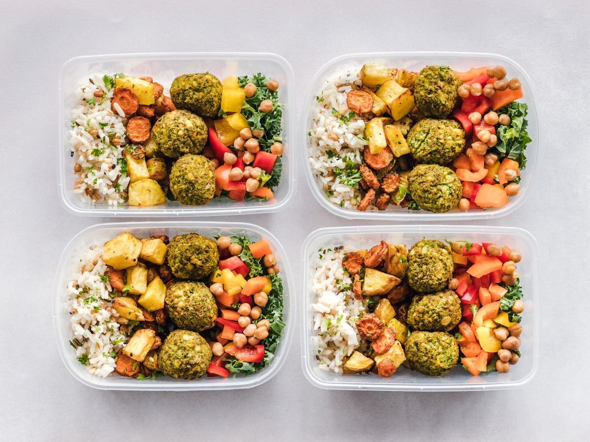 Prepared hot meals packed in lunch containers