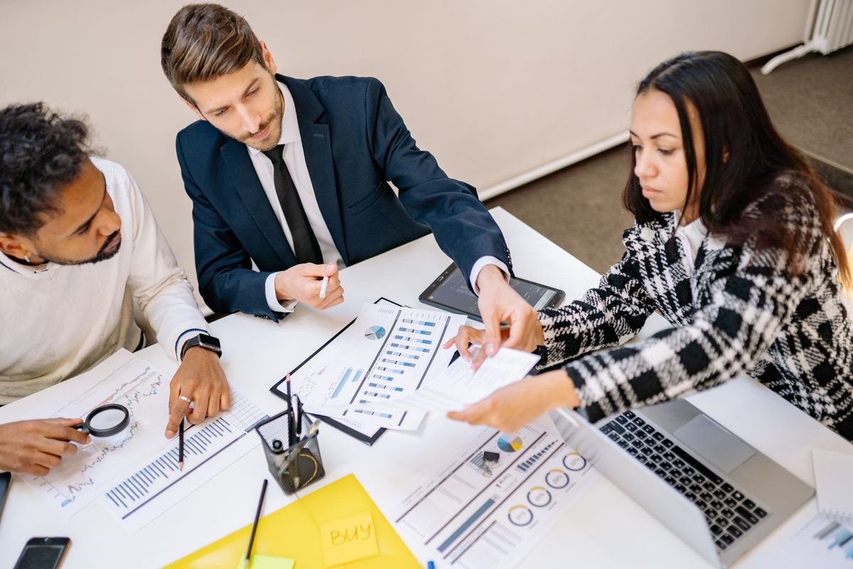 AgencyAxiom strategy team reviewing campaign results